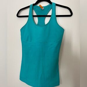 Lucy teal workout top, very slimming and tight, bra support, size Small